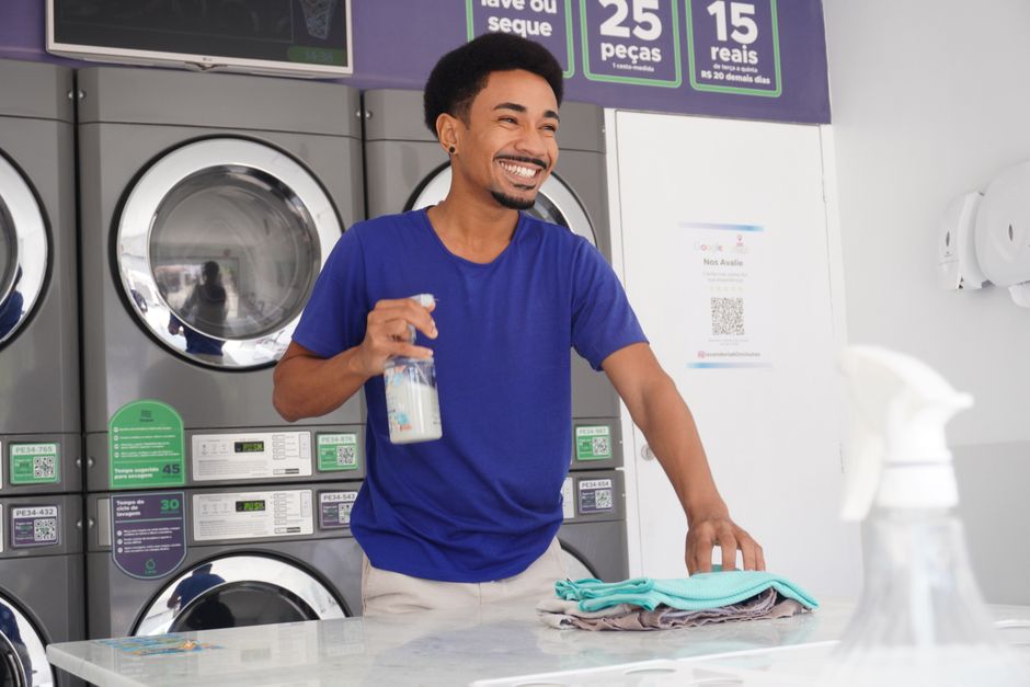 Photo by Gyldo . on Pexels Smiling man folding clothes in a laundromat in Pernambuco, Brazil. Photo by Gyldo . on Pexels