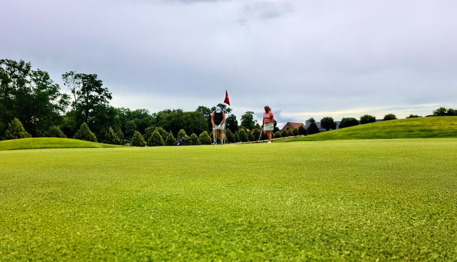 Photo by Martin Magnemyr on Pexels Two women enjoy a game of golf on a lush course in Skåne län, Sweden. Photo by Martin Magnemyr on Pexels