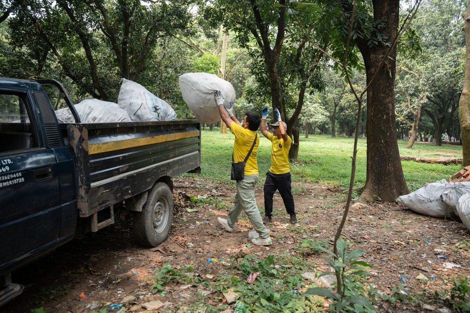 Photo by Galib Rahman Nadim on Pexels Workers in high visibility vests loading a small truck with rubbish bags outdoors. Photo by Galib Rahman Nadim on Pexels