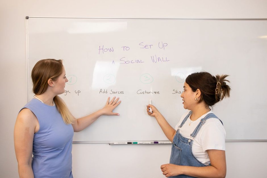 Photo by Walls.io on Pexels Two women planning at a whiteboard in a bright office. Photo by Walls.io on Pexels