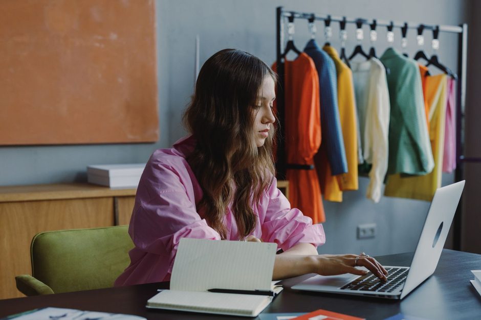 Photo by Ron Lach on Pexels Small business owner working on a laptop in a clothing boutique. Photo by Ron Lach on Pexels