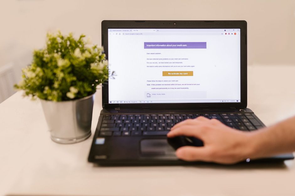 Person filling in an online form on a laptop at a desk. Photo by RDNE Stock project on Pexels