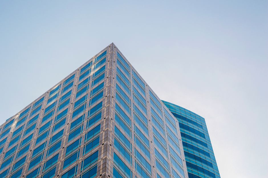 Photo by Gotta Be Worth It on Pexels Low angle view of a modern skyscraper with reflective glass windows against a clear sky. Photo by Gotta Be Worth It on Pexels