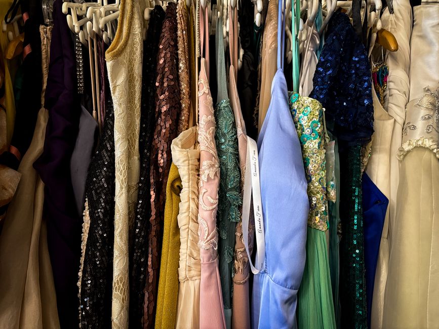 Photo by Magda Ehlers on Pexels A vibrant collection of vintage dresses hanging on racks, showcasing diverse styles and fabrics. Photo by Magda Ehlers on Pexels