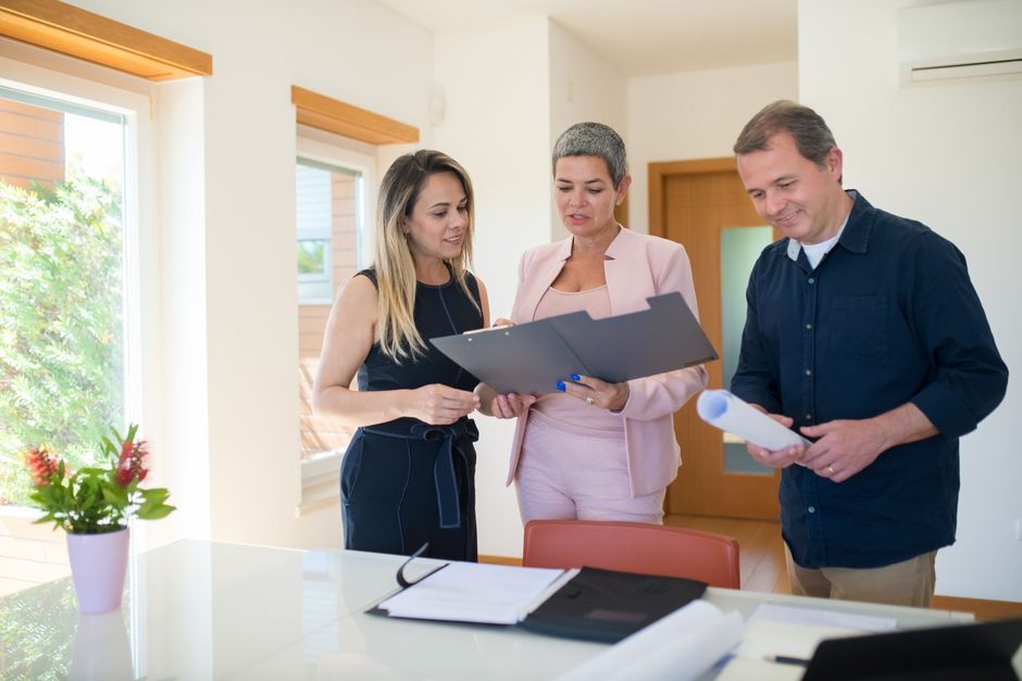 Photo by Kampus Production on Pexels Colleagues reviewing property documents together at a bright office table. Photo by Kampus Production on Pexels
