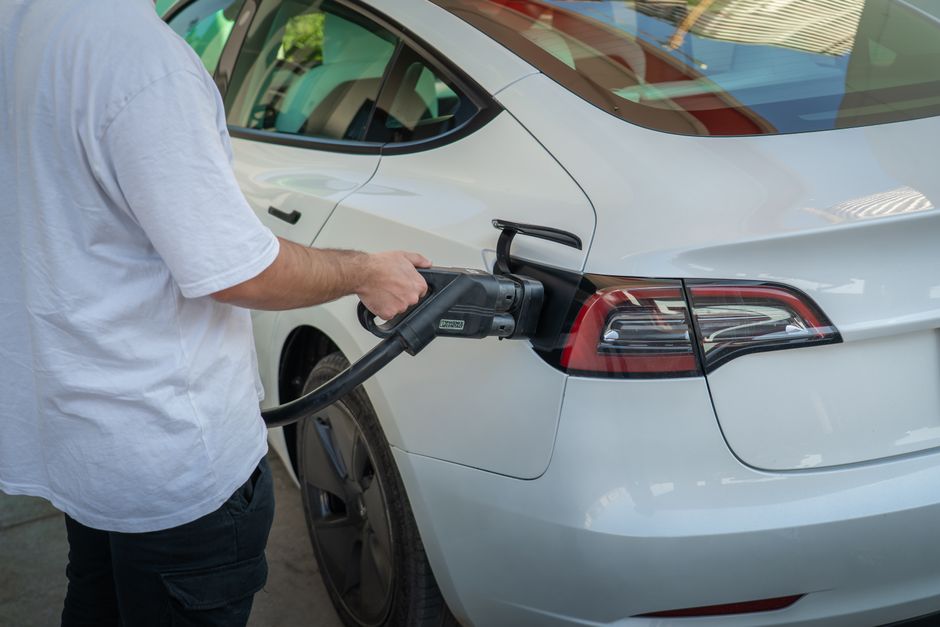 Photo by 04iraq on Pexels Electric car being charged at a station, highlighting eco-friendly transportation. Photo by 04iraq on Pexels