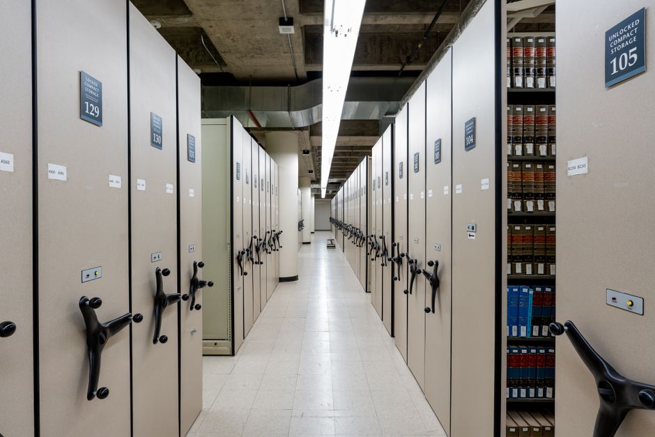 Photo by Eric Lozaga on Pexels Spacious library archive with organized compact shelving and storage units. Photo by Eric Lozaga on Pexels