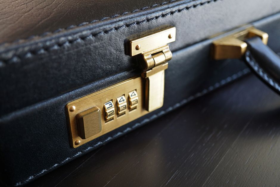 Photo by Nancy Zjaba on Pexels Close-up of a black leather briefcase with a brass combination lock for business security. Photo by Nancy Zjaba on Pexels