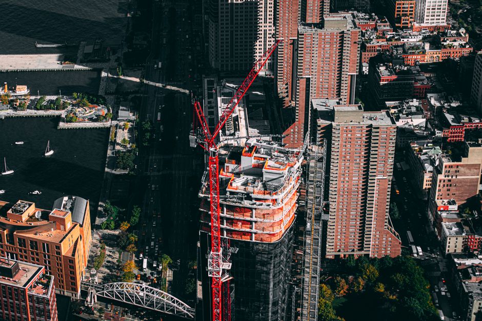 Photo by Matthis Volquardsen on Pexels Aerial view of a construction site in downtown New York City with surrounding buildings. Photo by Matthis Volquardsen on Pexels