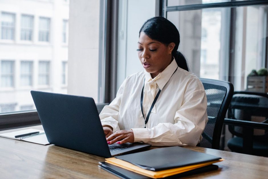 Photo by Sora Shimazaki on Pexels Professional woman working at a laptop with a notebook in a bright office. Photo by Sora Shimazaki on Pexels