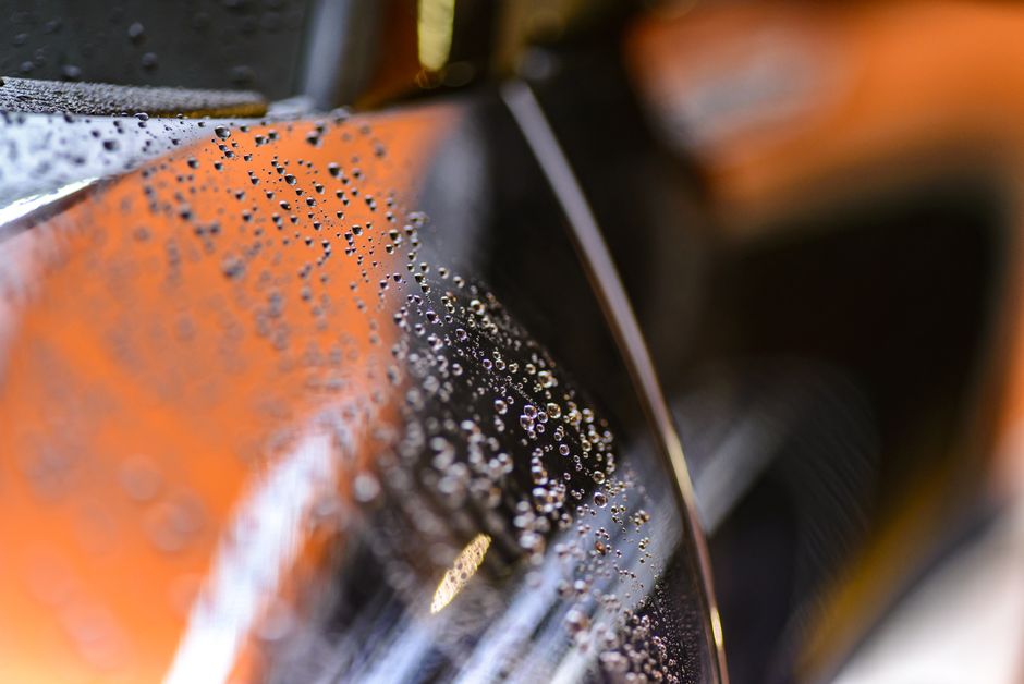 Photo by Pixabay on Pexels Close-up view of water droplets on a glossy car surface with a blurred background. Photo by Pixabay on Pexels
