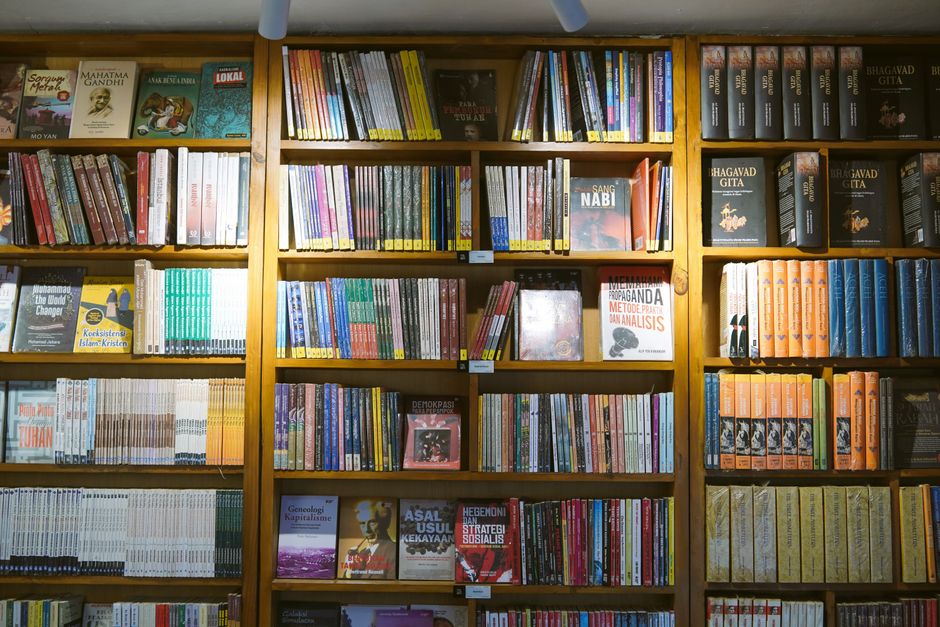 Photo by Yazid N on Pexels A wide view of bookshelves filled with various books, showcasing knowledge and diversity in a library setting. Photo by Yazid N on Pexels