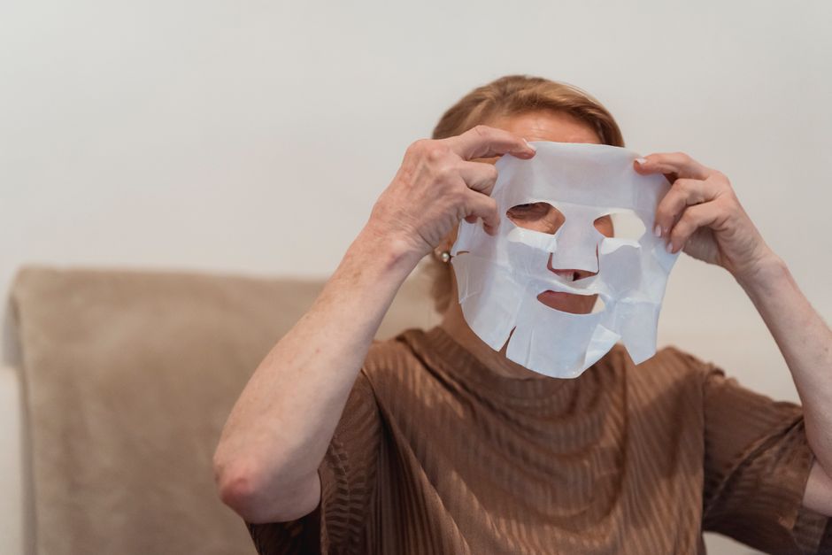 Photo by Teona Swift on Pexels Senior woman applying a sheet face mask for skincare and relaxation indoors. Photo by Teona Swift on Pexels