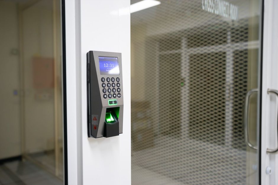 Photo by panumas nikhomkhai on Pexels Biometric fingerprint access control reader mounted next to an office door. Photo by panumas nikhomkhai on Pexels