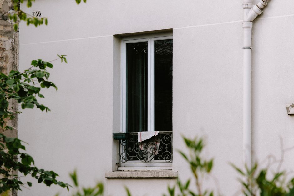 Photo by Mathias Reding on Pexels A window with decorative grill and cloth on a residential building wall. Photo by Mathias Reding on Pexels