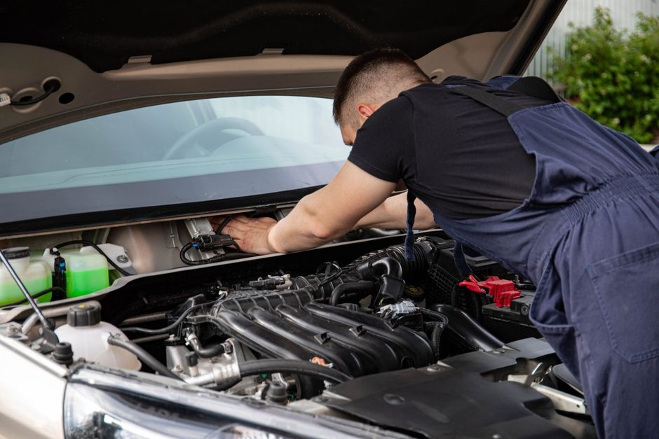 Photo by Sergey Meshkov on Pexels Mechanic in blue overalls working on a car engine under the open hood. Photo by Sergey Meshkov on Pexels