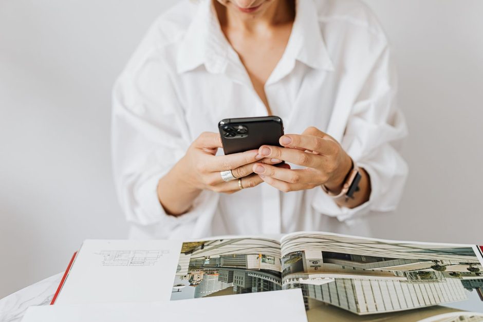 Photo by https://kaboompics.com/ on Pexels Person holding a smartphone browsing a website while seated at a table. Photo by https://kaboompics.com/ on Pexels