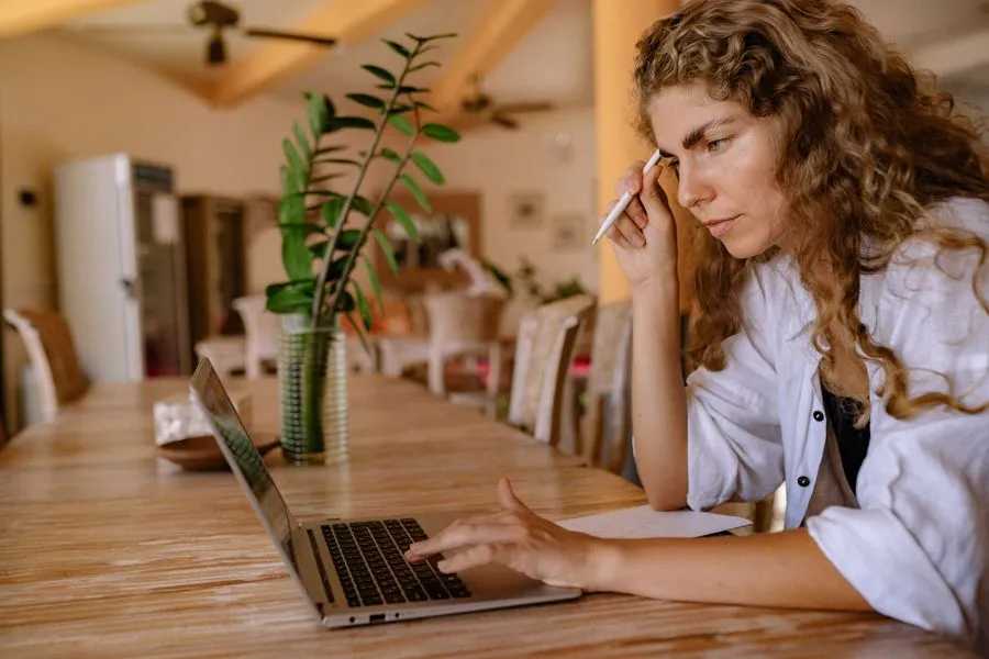 Optometry - Woman researching wellness options on a laptop at home. Photo by Yan Krukau on Pexels
