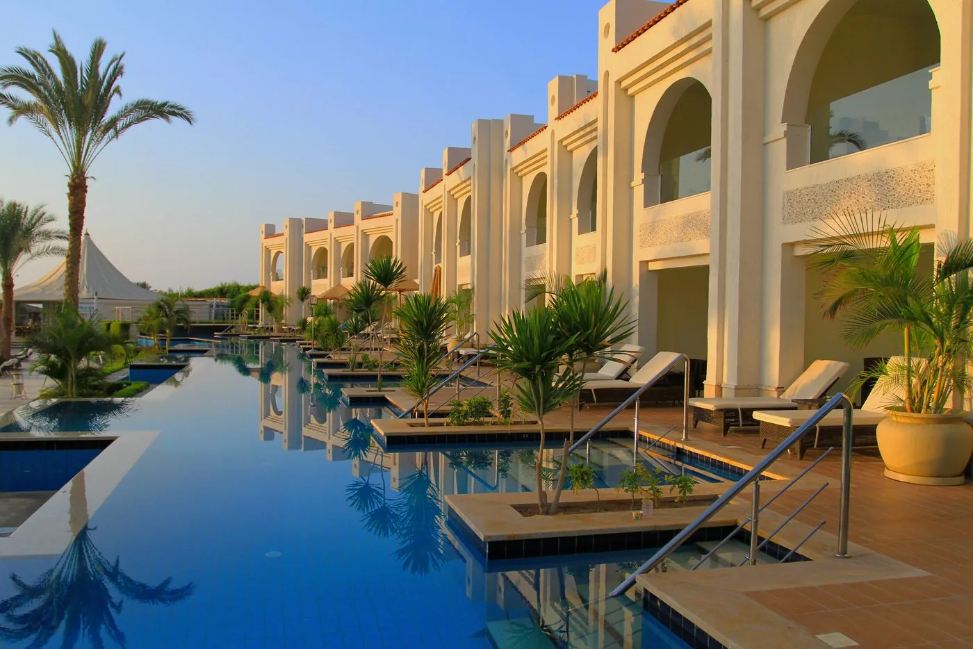 Elegant resort with a luxurious infinity pool and ocean view. Photo by Сокіл Sokil on Pexels
