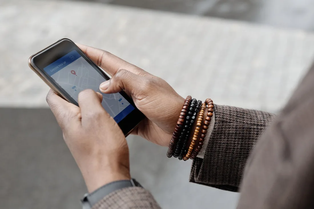 Person using a smartphone to search for a local service. Photo by Theo  Decker on Pexels