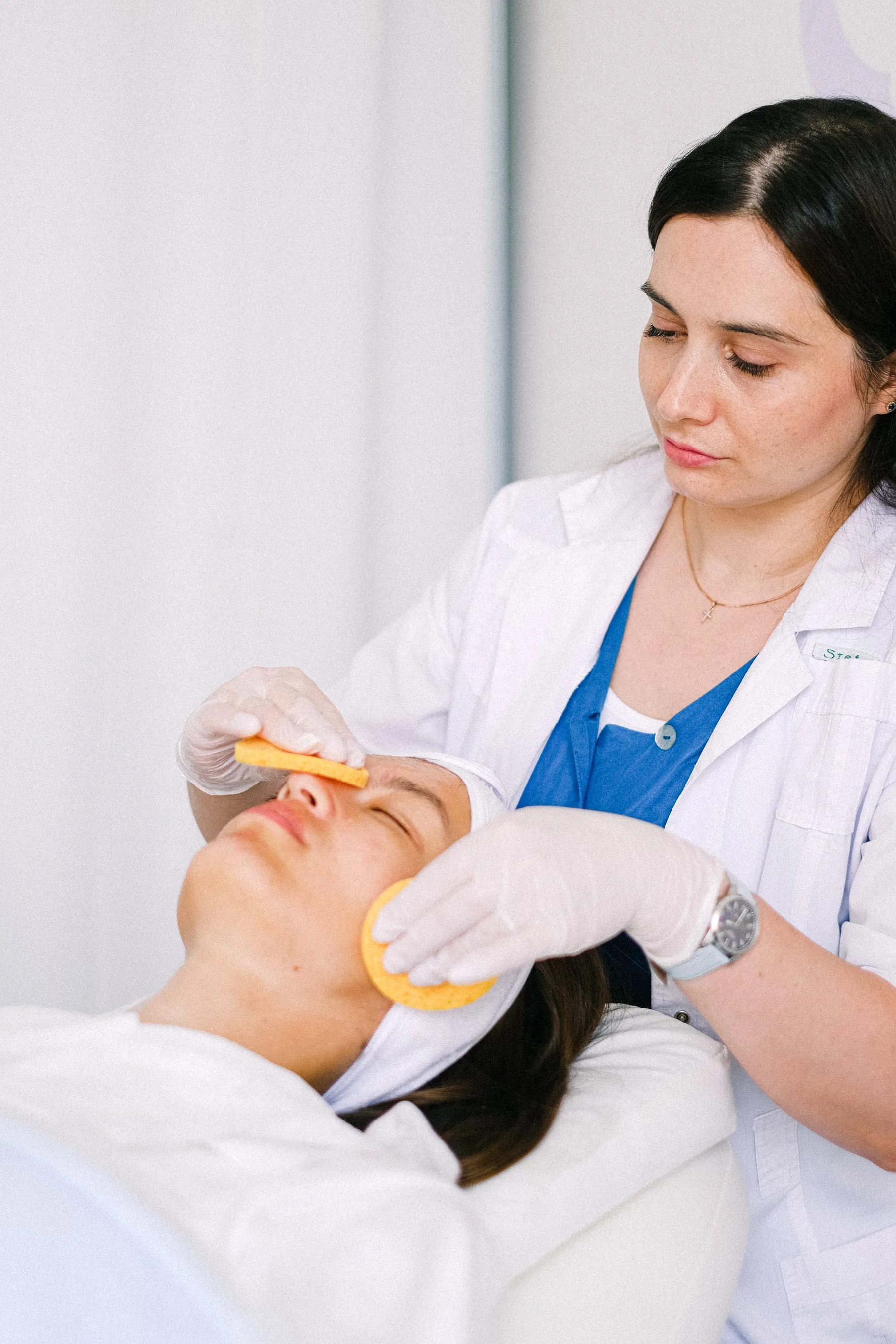Client researching medical aesthetics treatments. Photo by Anna Shvets on Pexels