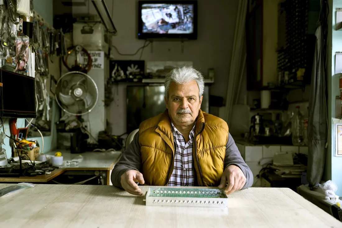Elderly man in his workshop working on electronics in Istanbul. Photo by Yetkin Ağaç on Pexels