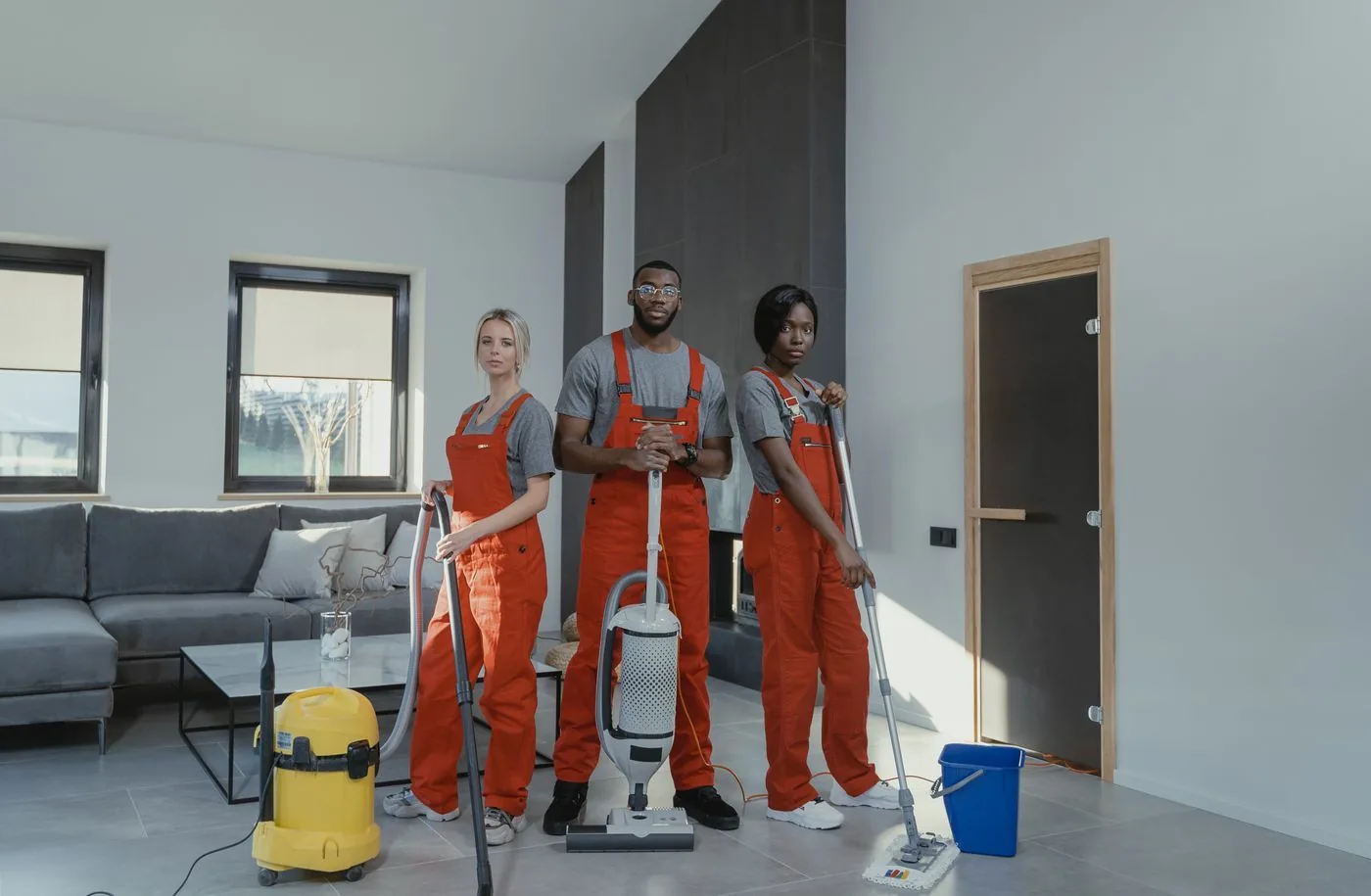 Garage Doors — Professional cleaning team with vacuum and mop equipment in a modern home. Photo by Tima Miroshnichenko on Pexels