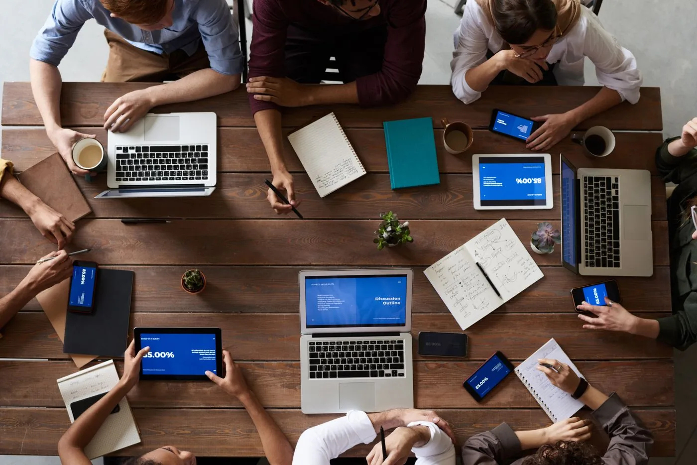 Energy Audits and Efficiency — Sales team reviewing qualified energy lead reports together. Photo by fauxels on Pexels