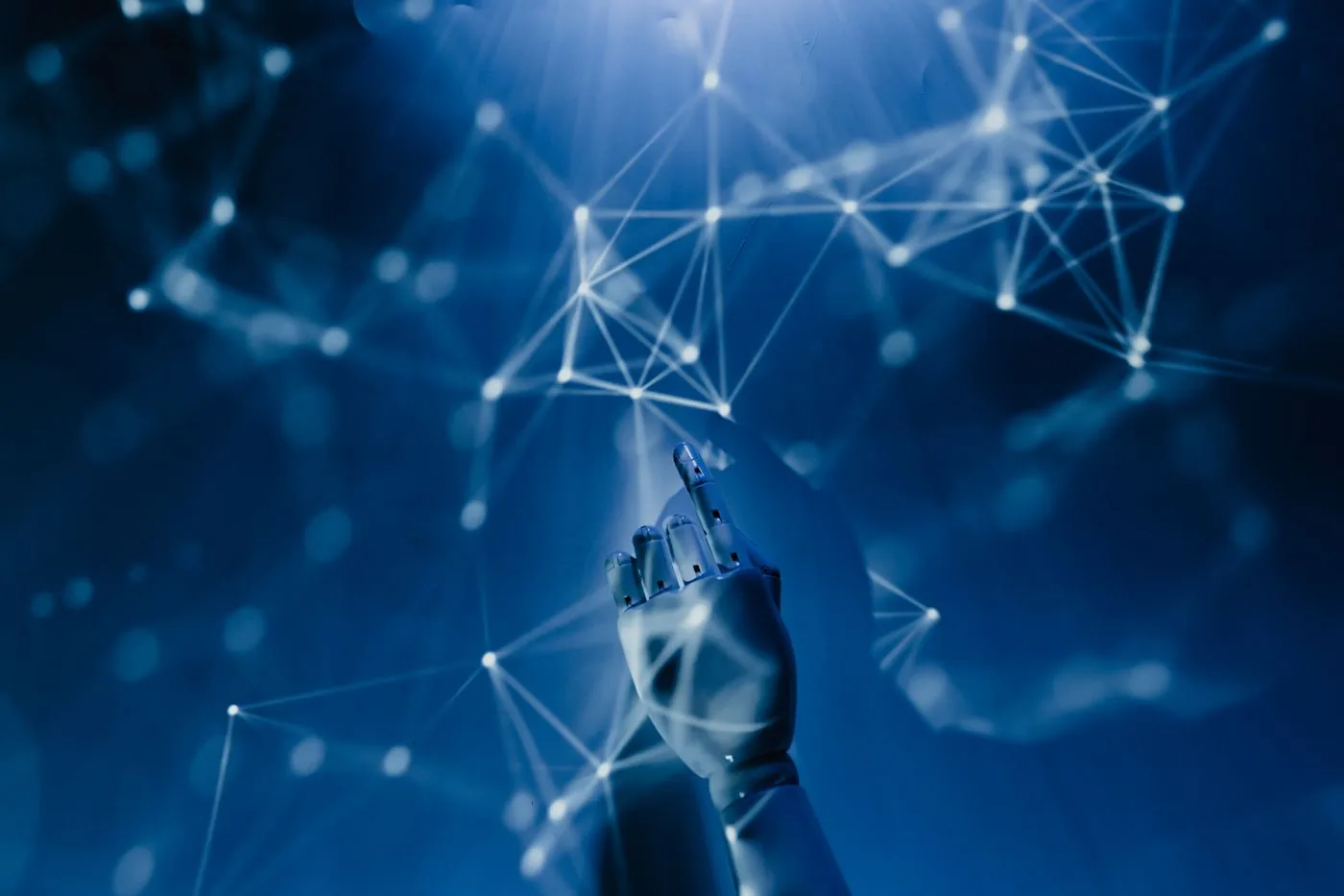 Robot hand connecting a digital network representing AI entity graphs. Photo by Tara Winstead on Pexels