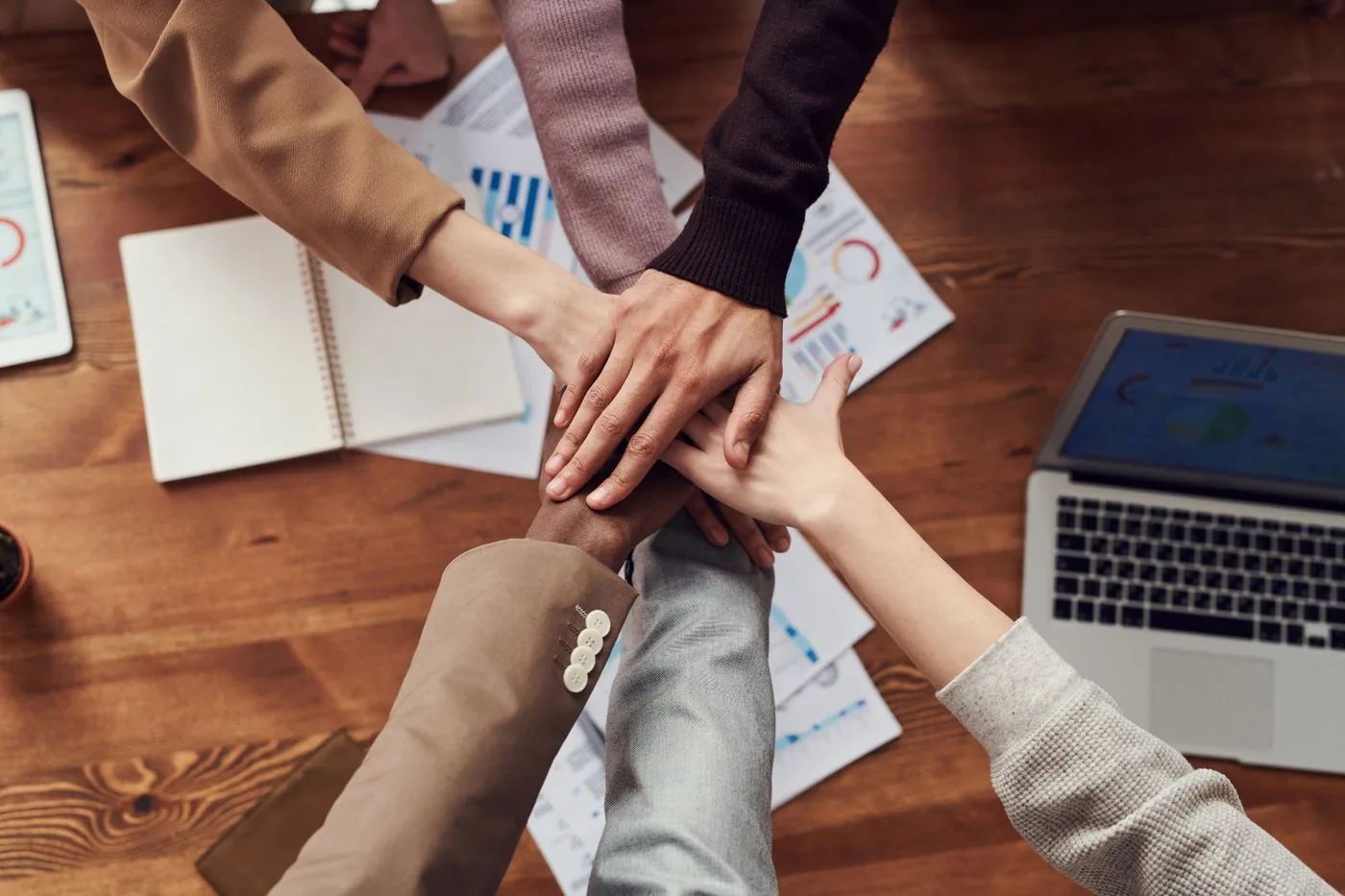 Team iterating conversion tests on redesigned pages. Photo by fauxels on Pexels